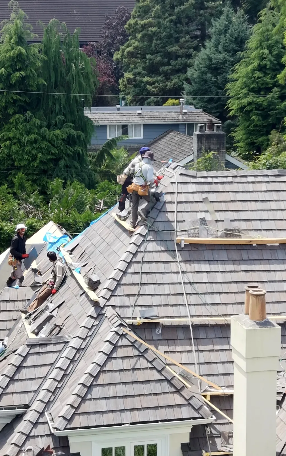 Stonnex installation team installing Brava composite shake tile with full safety compliance