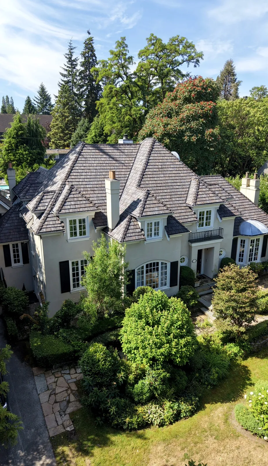 Brava composite cedar shake tile — front elevation of luxury home, installed by Stonnex Roofing Vancouver