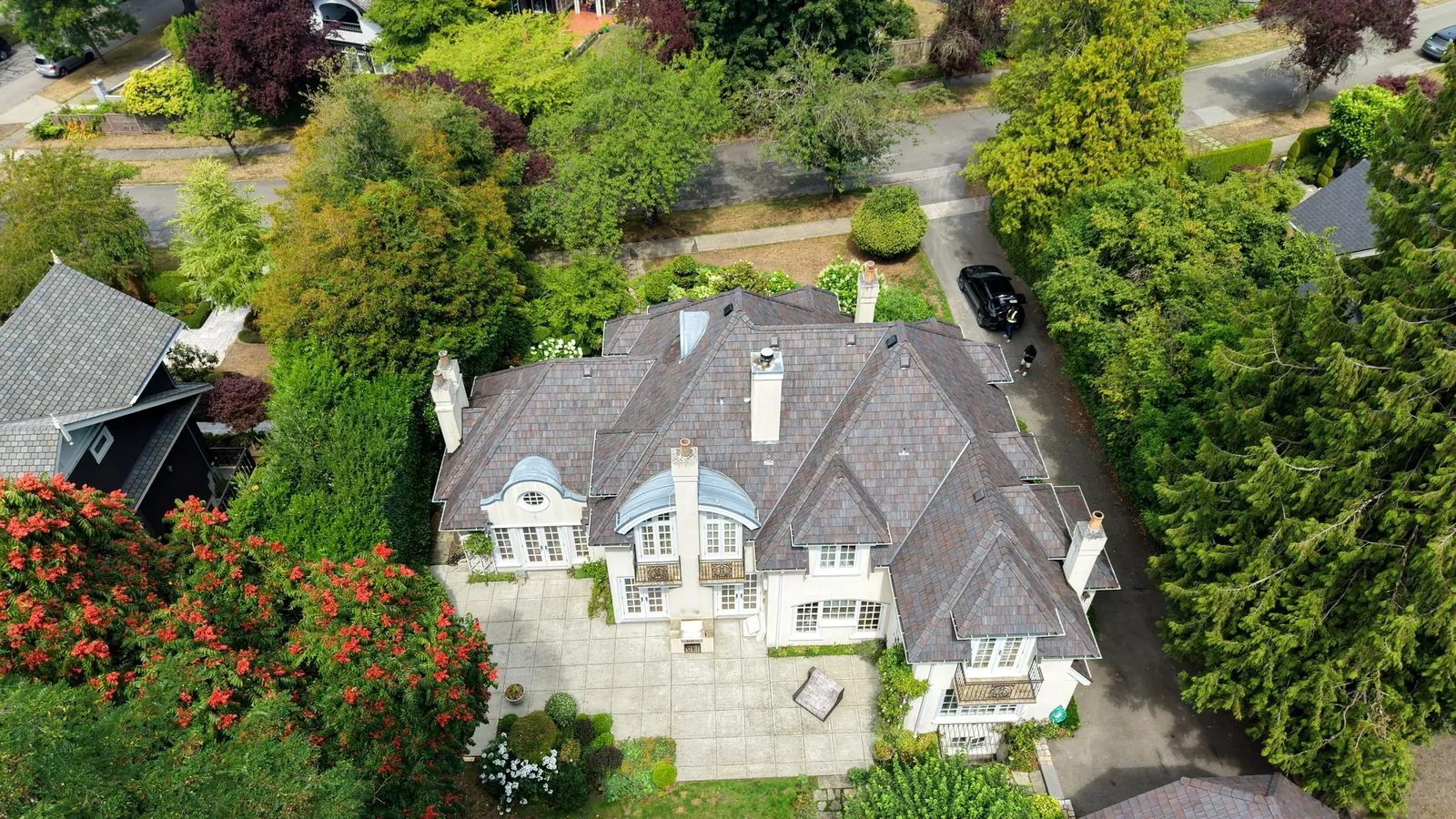 Completed Brava composite cedar shake roof — aerial neighbourhood view, Lower Mainland