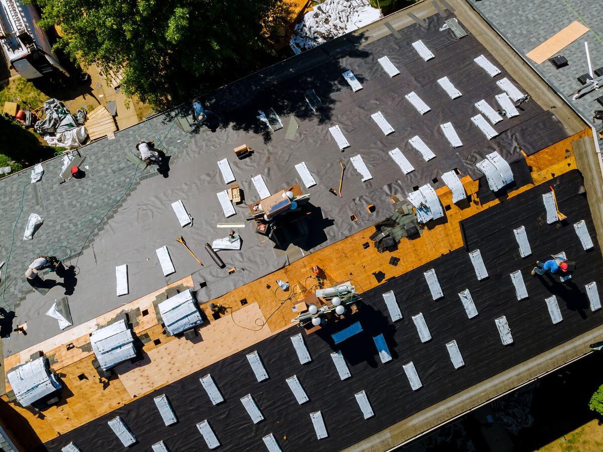 Commercial roofing installation &mdash; aerial view