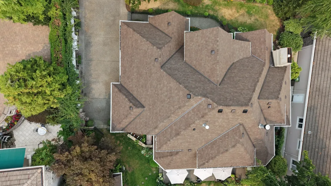 The same Eagle Mountain home after reroofing by Stonnex — new asphalt shingle roof seen from above
